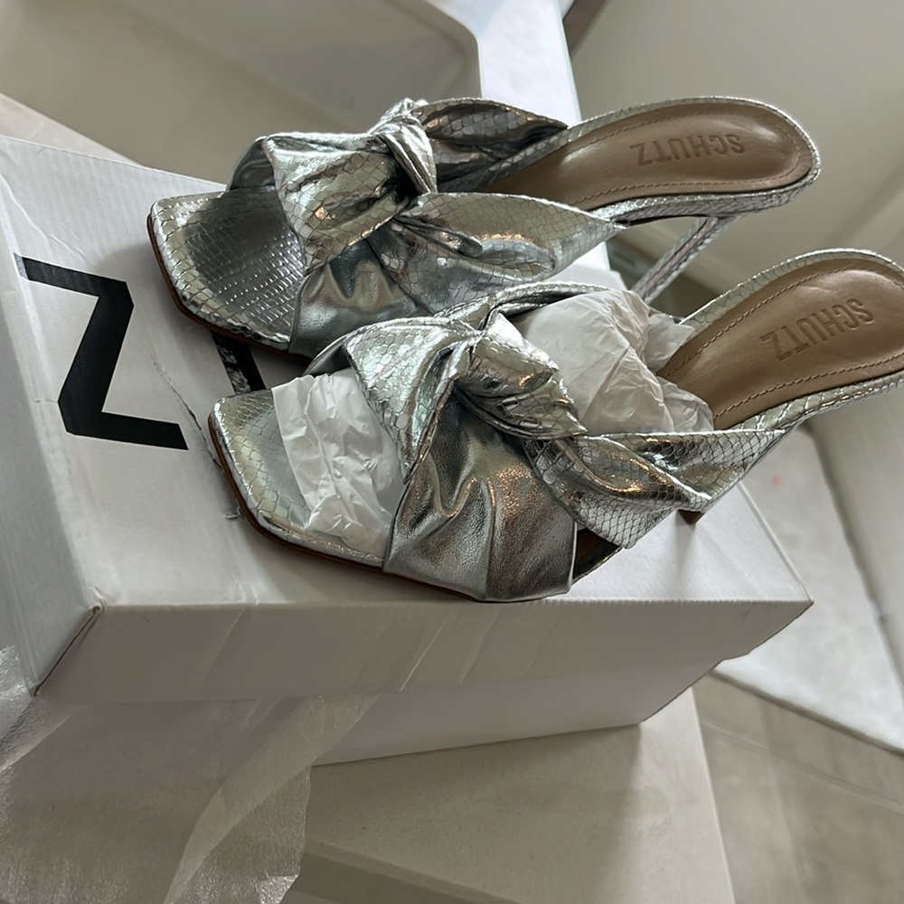 Brand New never worn Schutz silver mules